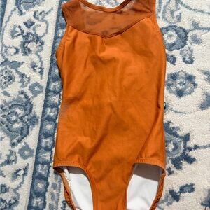 LuckyLeo rust orange leotard. Adult Extra Small